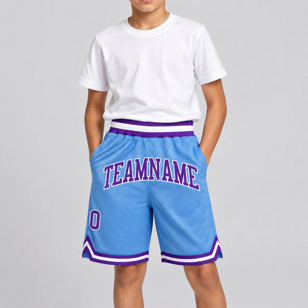 Custom Light Blue Authentic Throwback Basketball Shorts with Purple and White Lettering youth size worn by child model