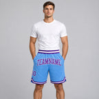 Custom Light Blue Authentic Throwback Basketball Shorts with Purple and White Lettering worn by male model