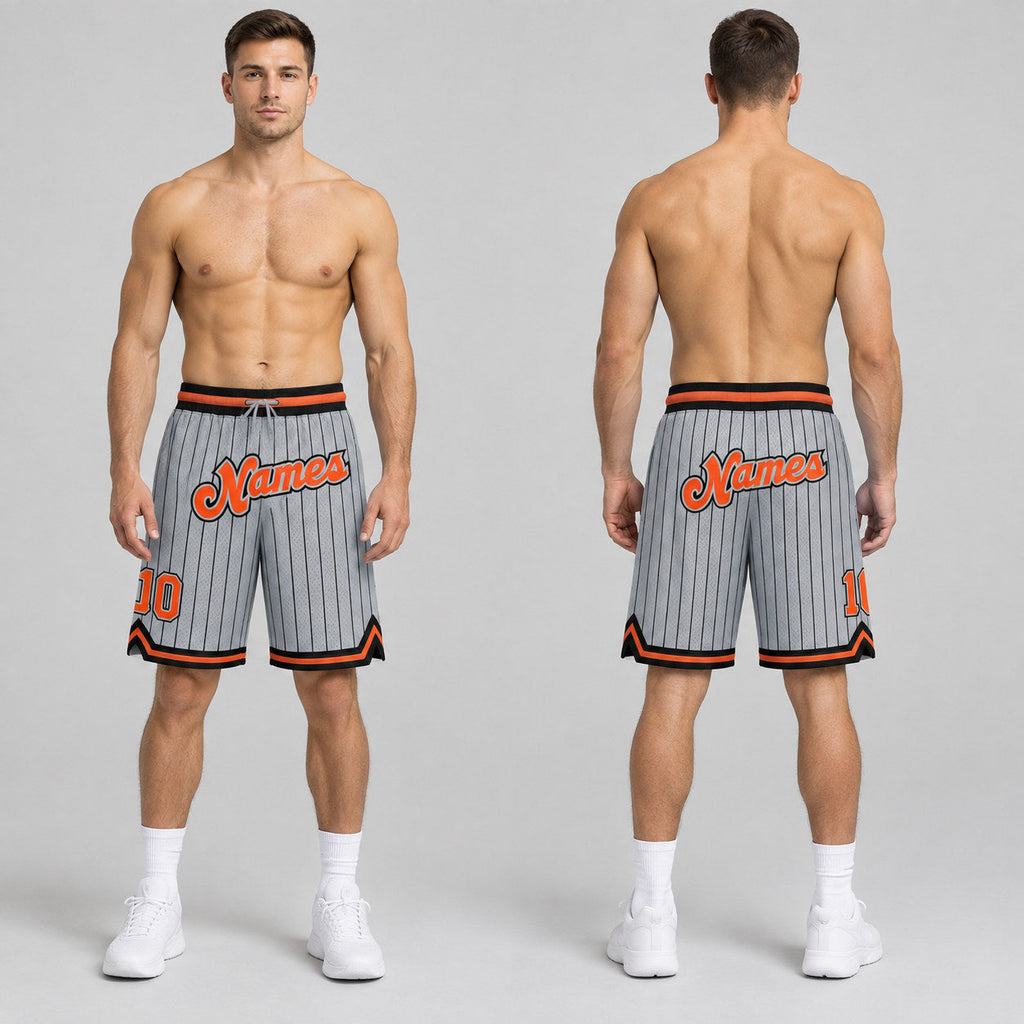 Custom Gray and Black Pinstripe Authentic Basketball Shorts with Orange and Black Lettering worn by male model