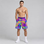 Custom Purple Tropical Palm Leaves Authentic Basketball Shorts with Gold and White Lettering worn by male model