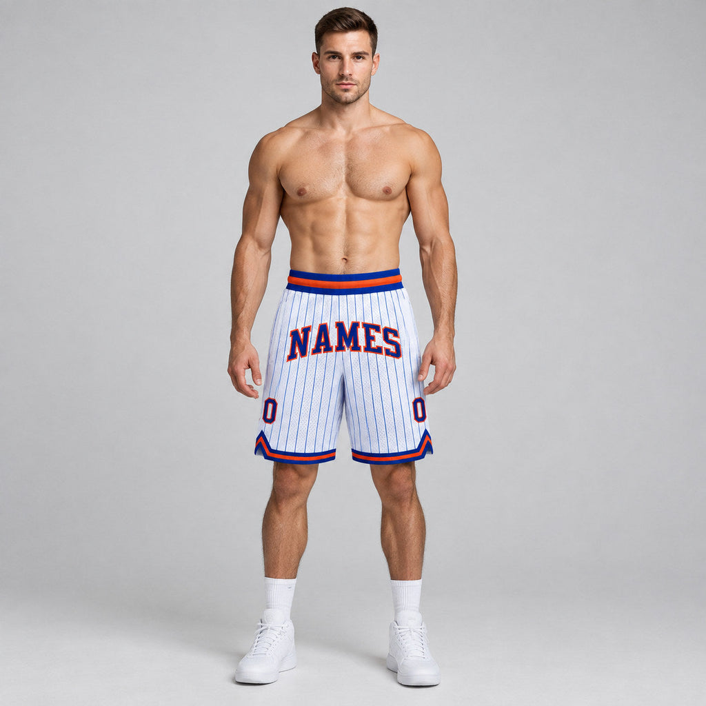 Custom White and Royal Pinstripe Authentic Basketball Shorts with Royal and Orange Lettering worn by male model