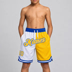 Custom White Authentic Throwback Basketball Shorts with Gold and Royal Lettering youth size worn by child model