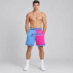 Custom Light Blue Authentic Throwback Basketball Shorts with Royal and Pink Lettering worn by male model