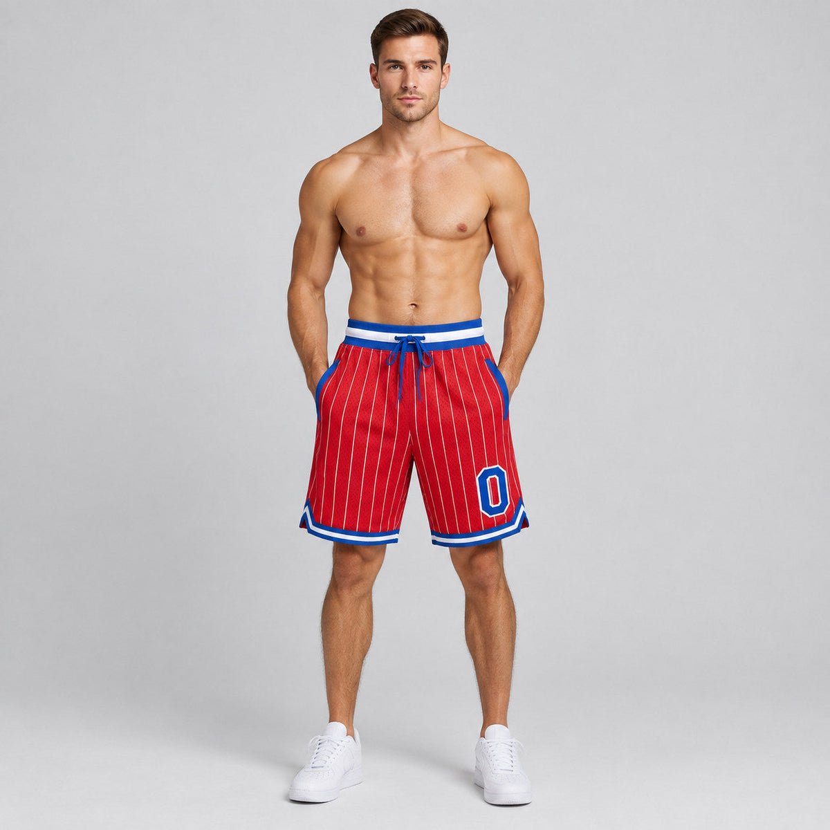Custom Red and White Pinstripe Authentic Basketball Shorts with Royal and White Lettering worn by male model