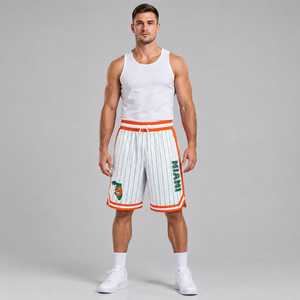 Custom White and Kelly Green GREAT STATE Basketball Shorts with Kelly Green and Orange Lettering worn by male model