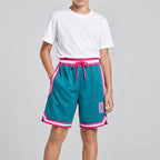 Custom Teal Authentic Throwback Basketball Shorts with Pink and White Lettering youth size worn by child model
