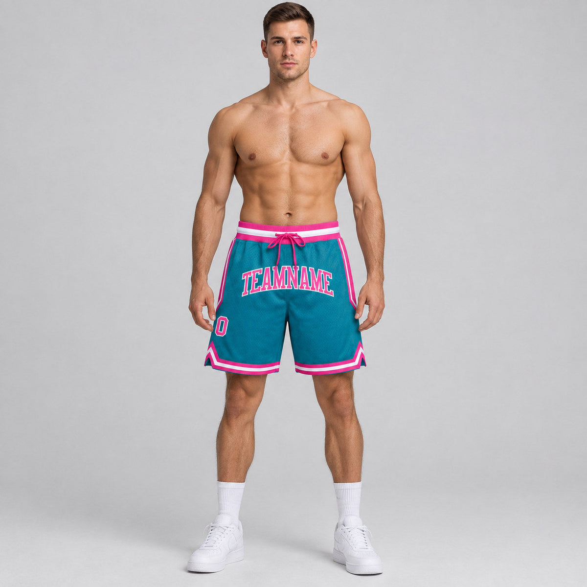 Custom Teal Authentic Throwback Basketball Shorts with Pink and White Lettering worn by male model