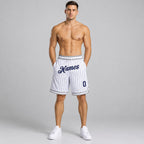 Custom White and Navy Pinstripe Authentic Basketball Shorts with Navy and Gray Lettering worn by male model