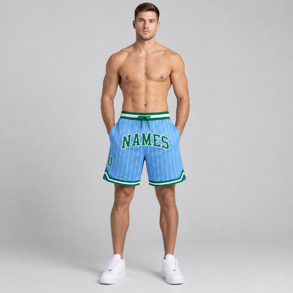 Custom Light Blue and White Basketball Shorts with Kelly Green and White Lettering worn by male model