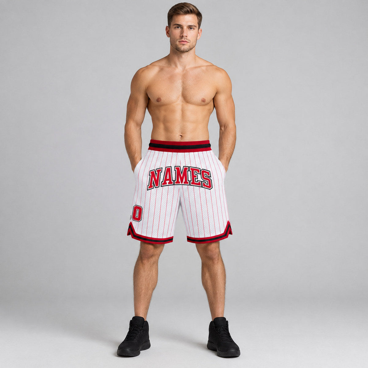 Custom White and Red Pinstripe Authentic Basketball Shorts with Red and Black Lettering worn by male model