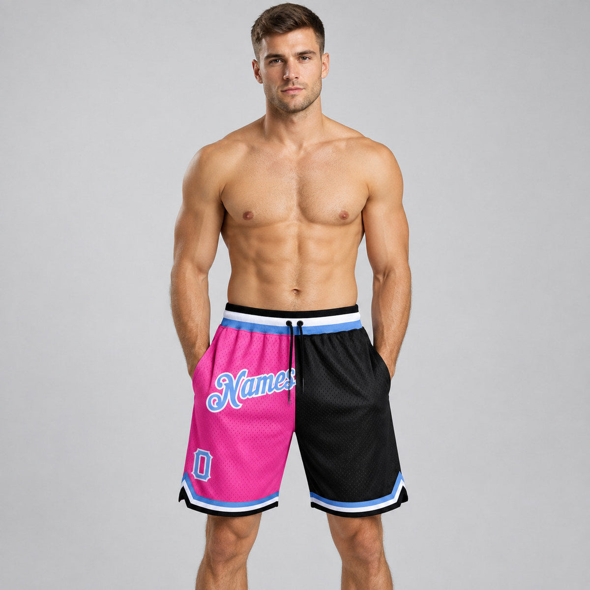 Custom Pink Authentic Throwback Basketball Shorts with Light Blue and Black Lettering worn by male model