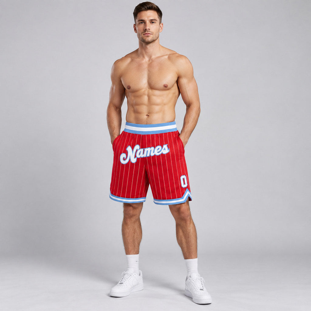 Custom Red and White Pinstripe Authentic Basketball Shorts with White and Light Blue Lettering worn by male model