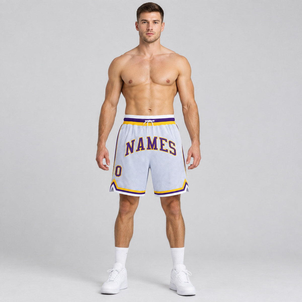Custom White Authentic Throwback Basketball Shorts with Purple and Gold Lettering Design 0433 worn by male model