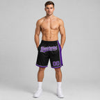 Custom Black Authentic Basketball Shorts with Purple and White Lettering worn by male model