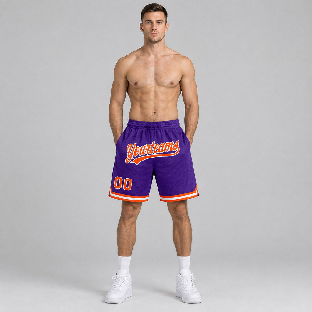 Custom Purple Authentic Throwback Basketball Shorts with Orange and White Lettering worn by male model