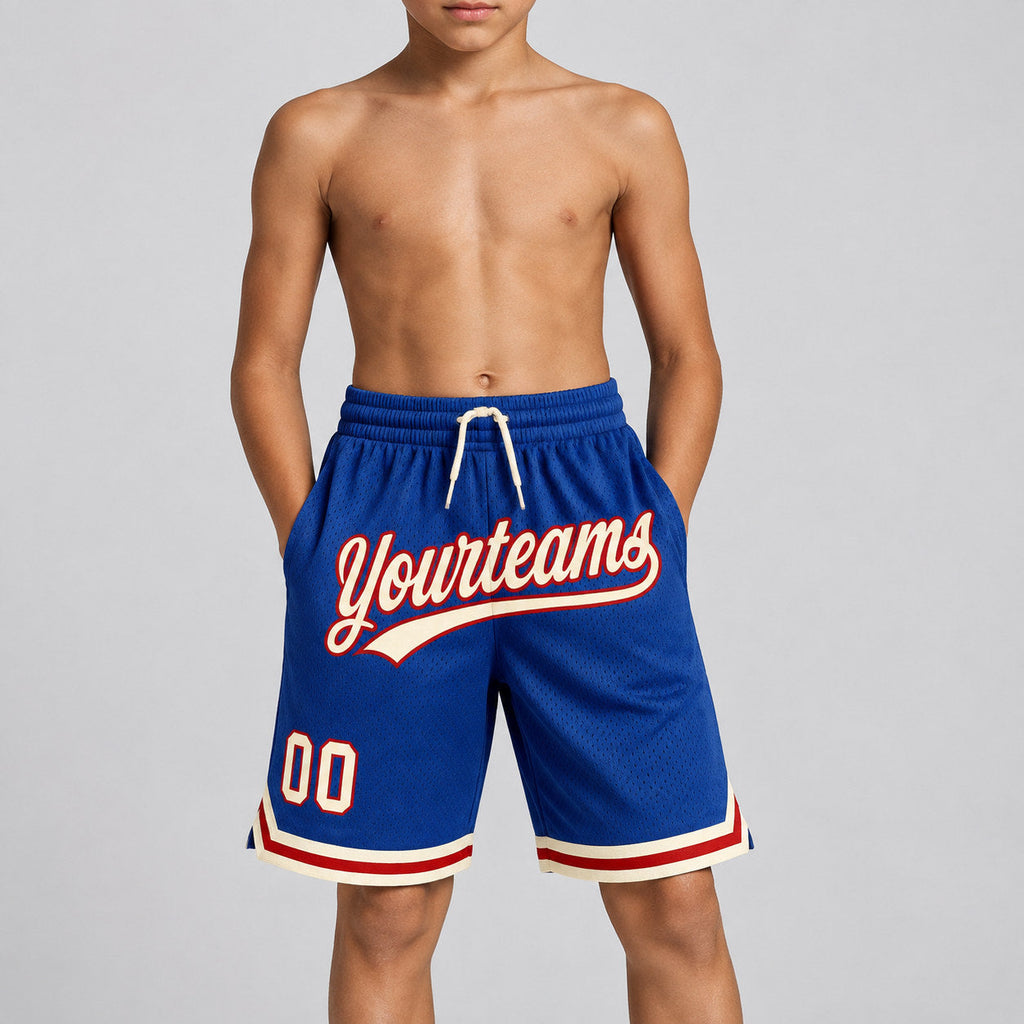 Custom Royal Authentic Throwback Basketball Shorts with Cream and Red Lettering youth size worn by child model