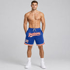 Custom Royal Authentic Throwback Basketball Shorts with Cream and Red Lettering worn by male model