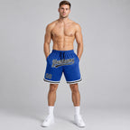 Custom Royal Authentic Throwback Basketball Shorts with Black and White Lettering worn by male model
