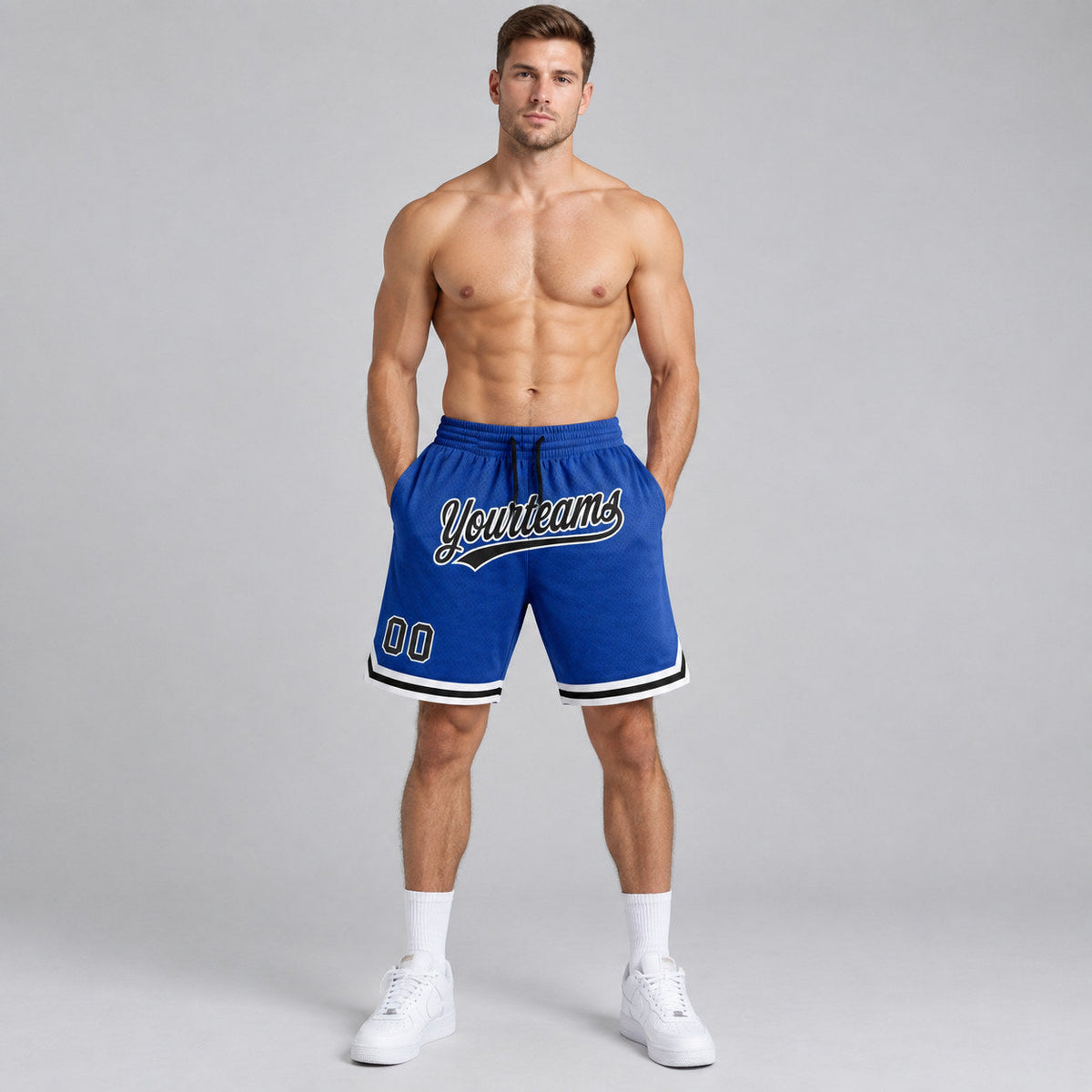 Custom Royal Authentic Throwback Basketball Shorts with Black and White Lettering worn by male model