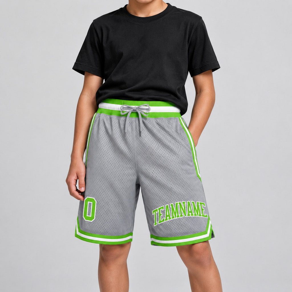 Custom Gray Authentic Throwback Basketball Shorts with Neon Green and White Lettering youth size worn by child model
