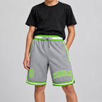 Custom Gray Authentic Throwback Basketball Shorts with Neon Green and White Lettering youth size worn by child model