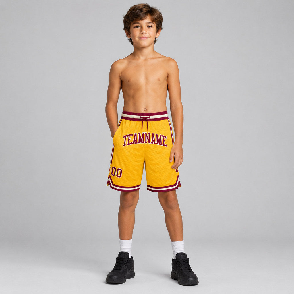 Custom Gold Authentic Throwback Basketball Shorts with Maroon and Cream Lettering youth size worn by child model
