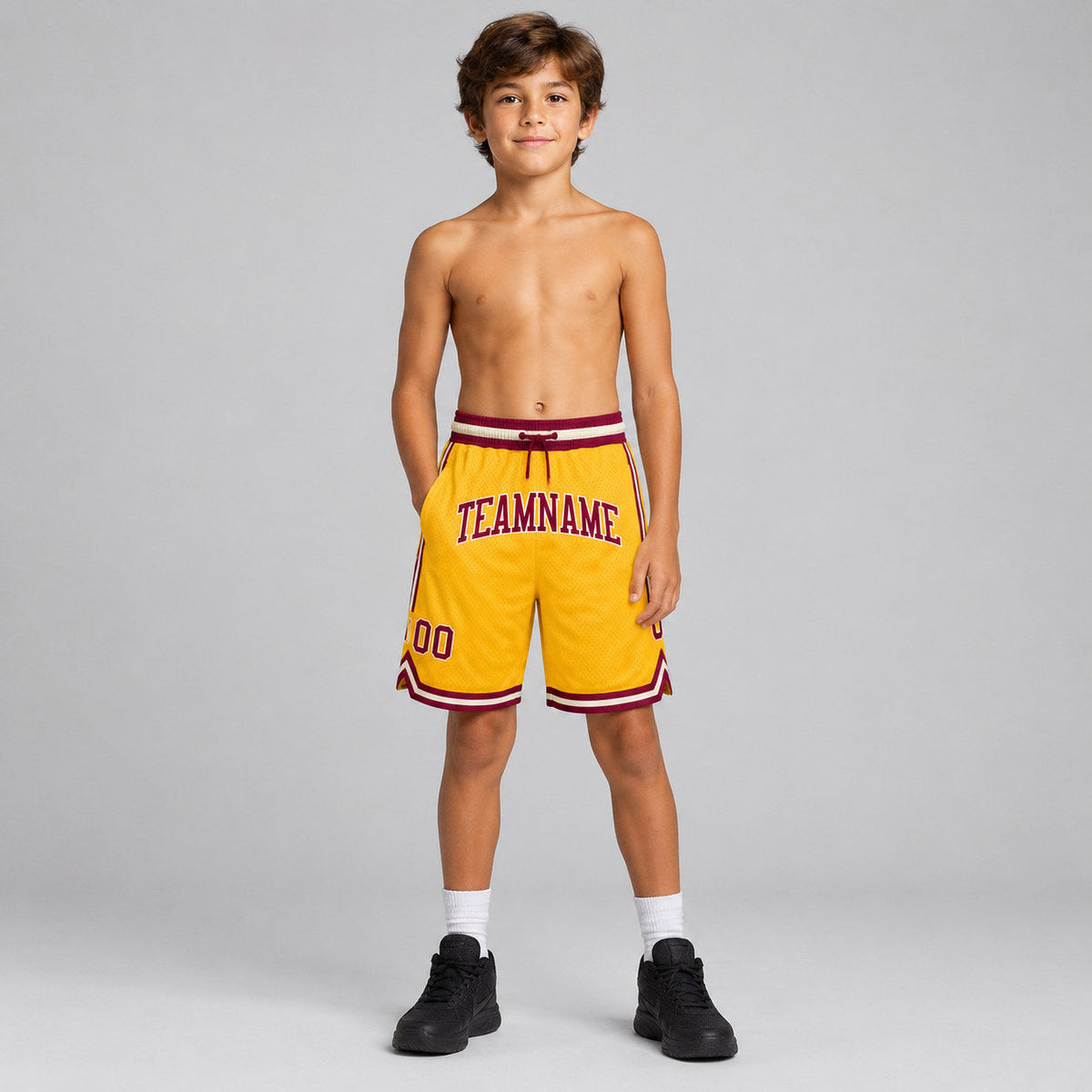 Custom Gold Authentic Throwback Basketball Shorts with Maroon and Cream Lettering youth size worn by child model