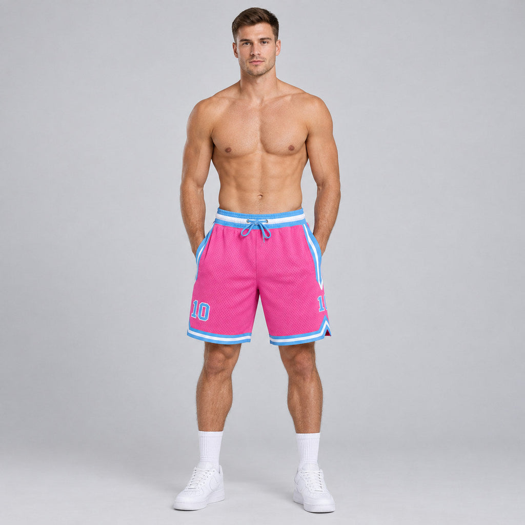 Custom Pink Authentic Throwback Basketball Shorts with Light Blue and White Lettering worn by male model