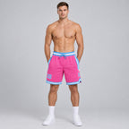 Custom Pink Authentic Throwback Basketball Shorts with Light Blue and White Lettering worn by male model