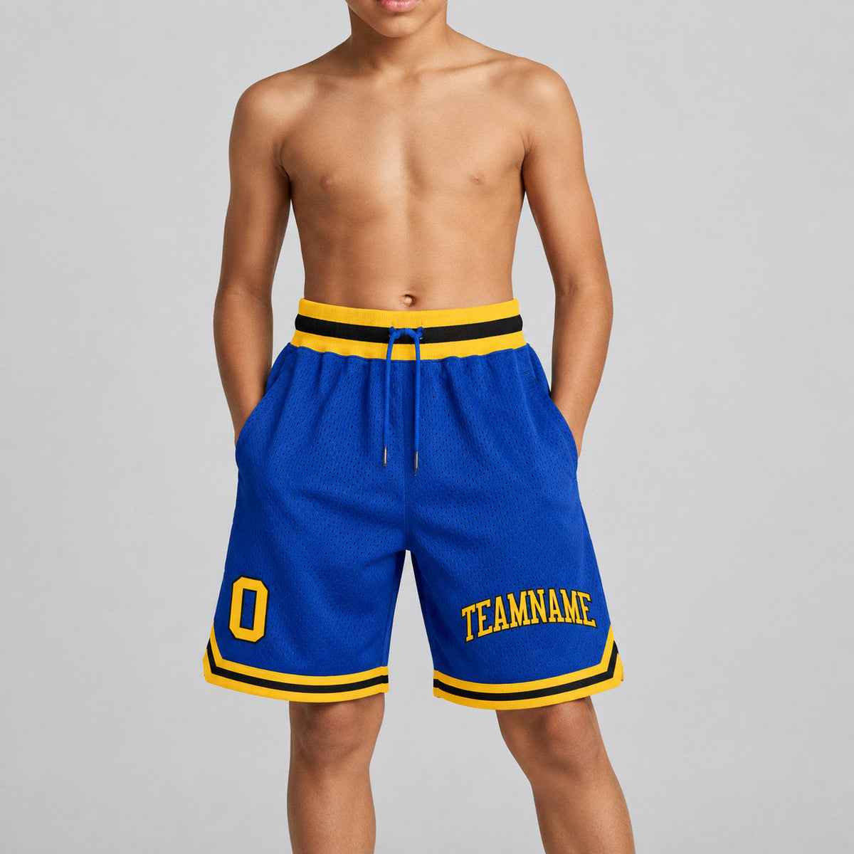 Custom Royal Authentic Throwback Basketball Shorts with Gold and Black Lettering youth size worn by child model