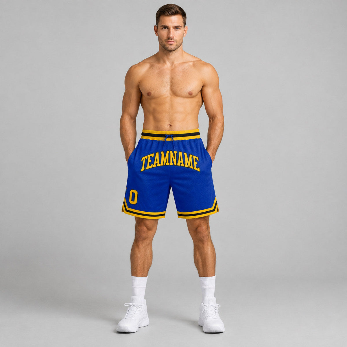 Custom Royal Authentic Throwback Basketball Shorts with Gold and Black Lettering worn by male model