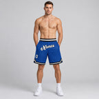 Custom Royal and White Pinstripe Authentic Basketball Shorts with White and Black Lettering worn by male model