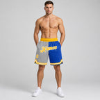 Custom Gray Authentic Throwback Basketball Shorts with Gold and Blue Lettering worn by male model