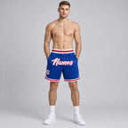 Custom Royal Authentic Throwback Basketball Shorts with White and Red Lettering worn by male model