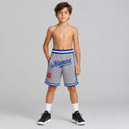 Custom Gray Authentic Throwback Basketball Shorts with Royal and Red Lettering youth size worn by child model