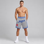 Custom Gray Authentic Throwback Basketball Shorts with Royal and Red Lettering worn by male model