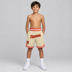 Custom Cream Authentic Throwback Basketball Shorts with Orange and White Lettering Design 0082 youth size worn by child model