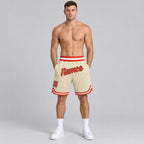 Custom Cream Authentic Throwback Basketball Shorts with Orange and White Lettering Design 0082 worn by male model
