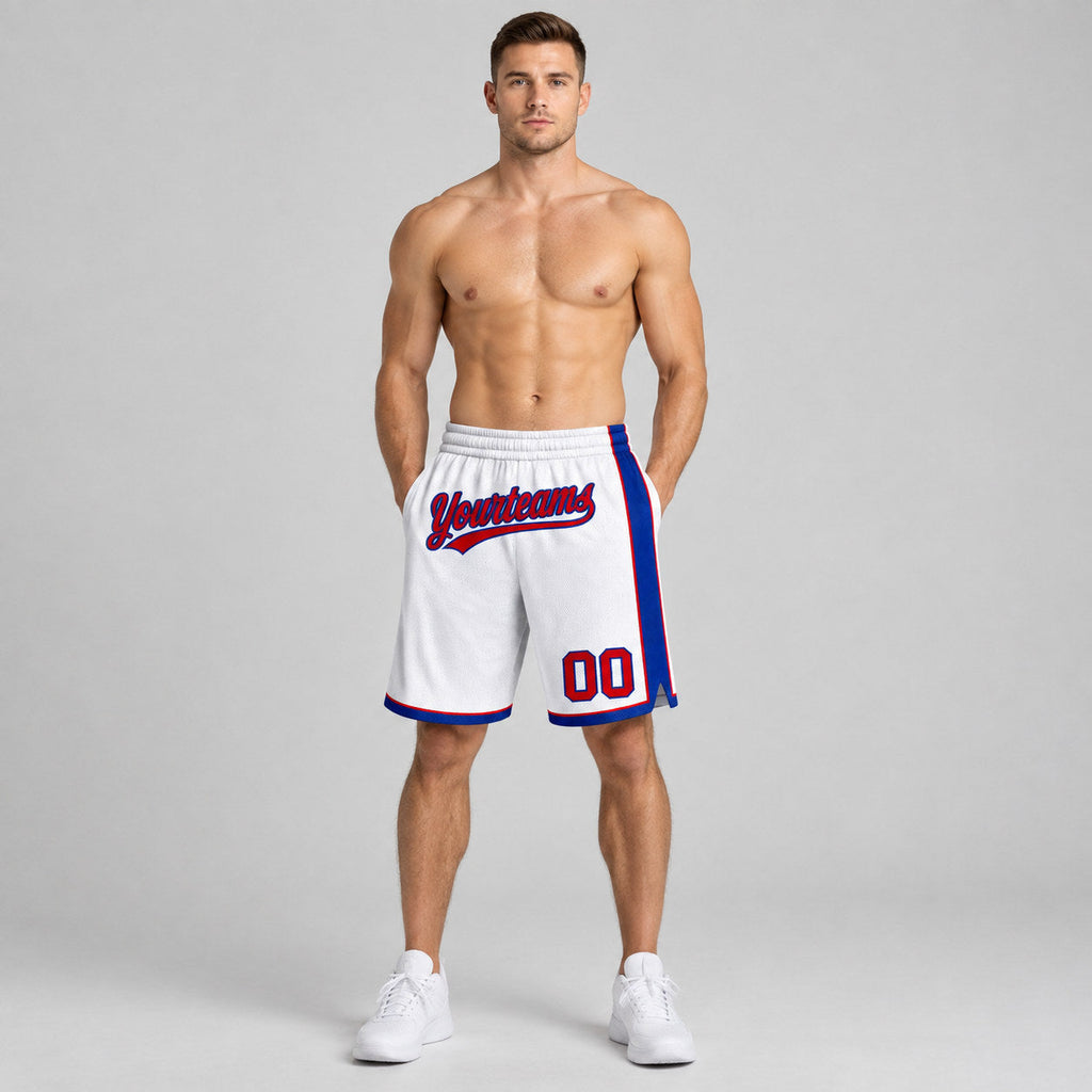 Custom White Authentic Basketball Shorts with Red and Royal Lettering worn by male model