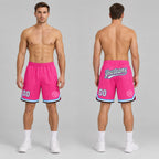 Custom Pink and White Authentic Throwback Basketball Shorts with Black and Light Blue Lettering worn by male model
