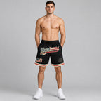 Custom Black Vintage USA Flag Authentic Throwback Basketball Shorts with Cream Lettering worn by male model