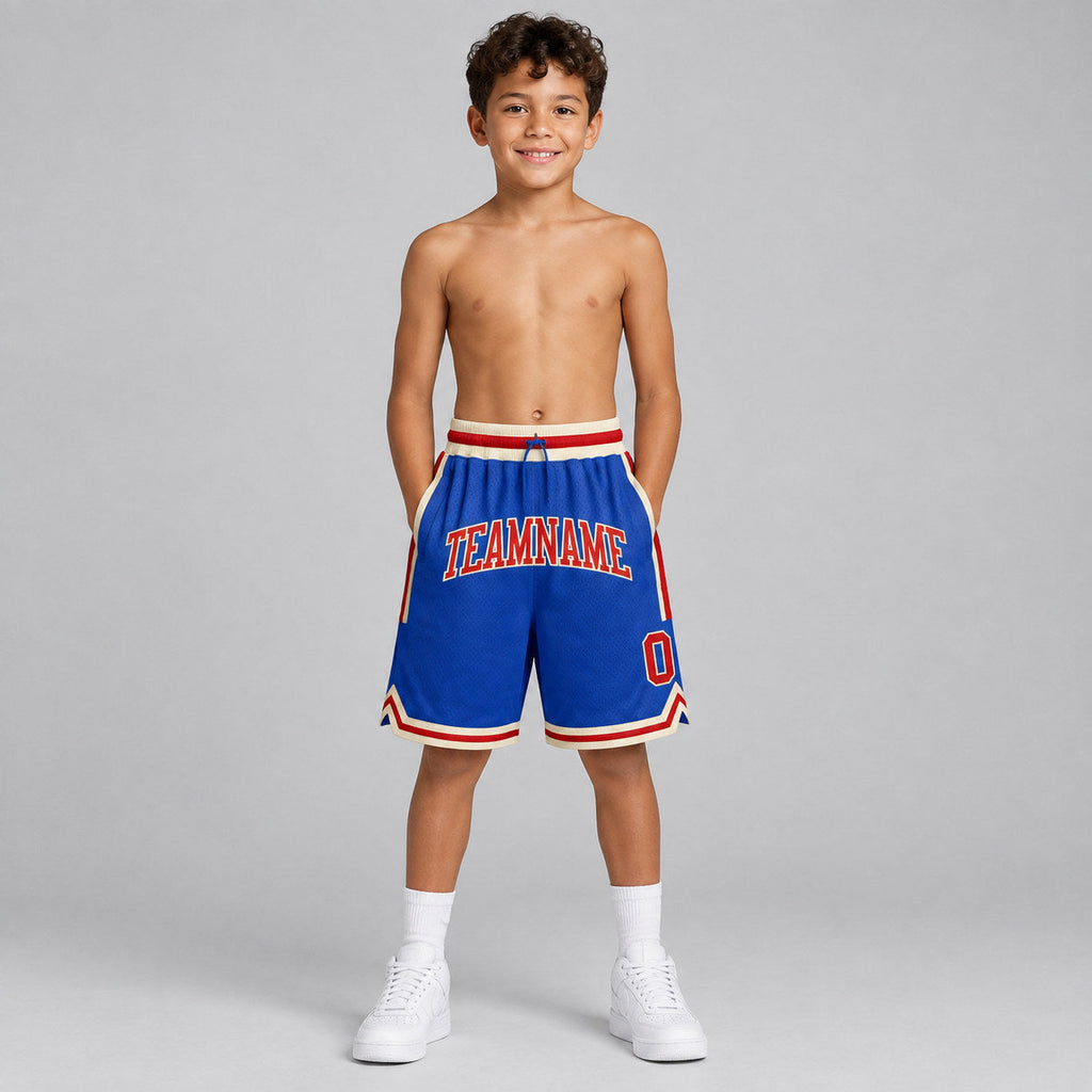 Custom Blue Authentic Throwback Basketball Shorts with Red and Cream Lettering youth size worn by child model