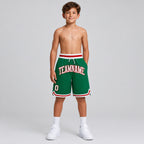 Custom Kelly Green Authentic Throwback Basketball Shorts with White and Red Lettering youth size worn by child model