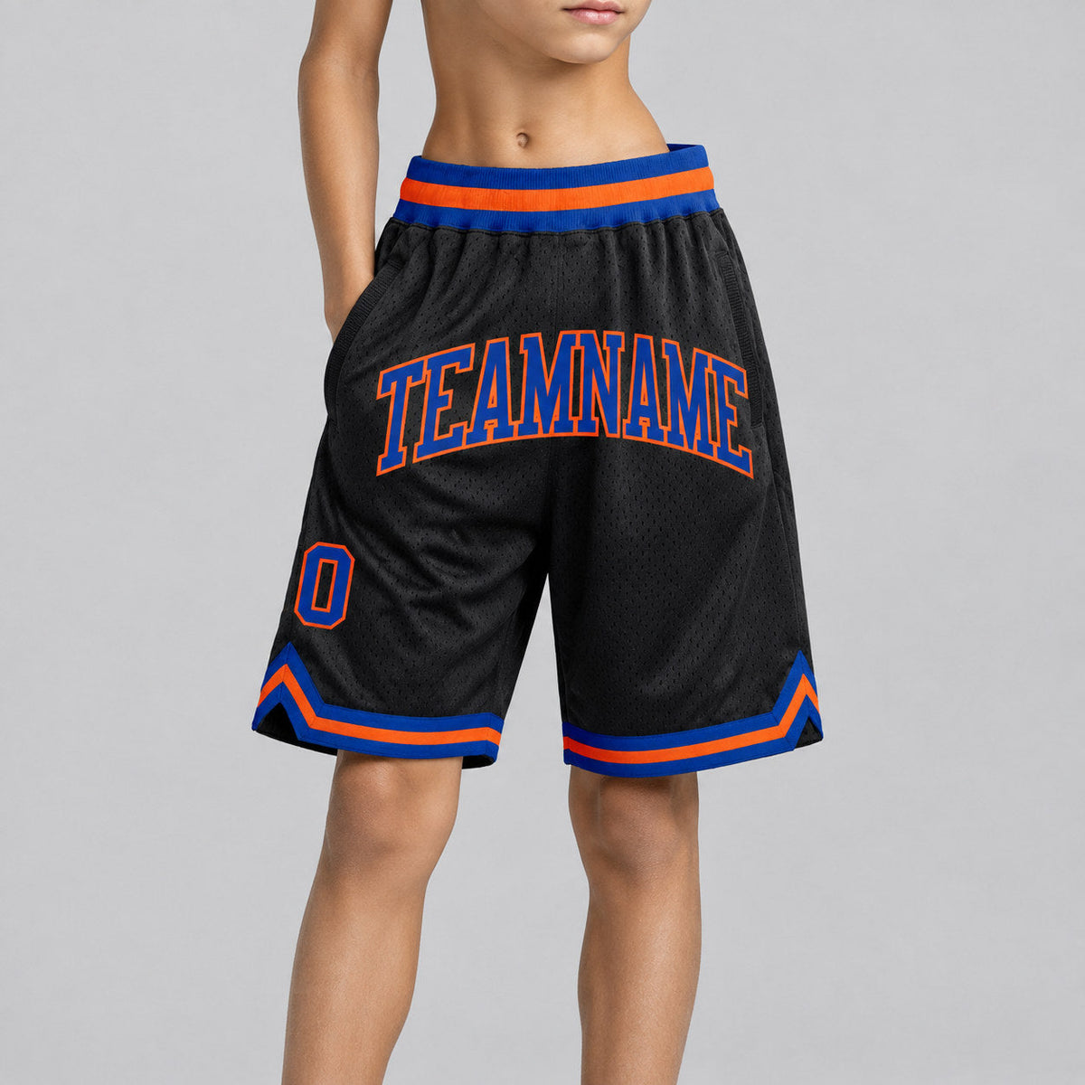 Custom Black Authentic Throwback Basketball Shorts with Royal and Orange Lettering Design 1275 youth size worn by child model