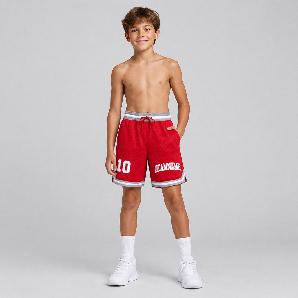 Custom Red Authentic Throwback Basketball Shorts with White and Gray Lettering youth size worn by child model