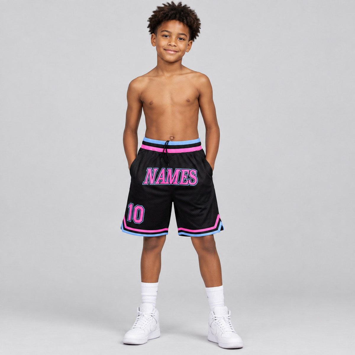 Custom Black Authentic Throwback Basketball Shorts with Pink and Light Blue Lettering Design 0315 youth size worn by child model