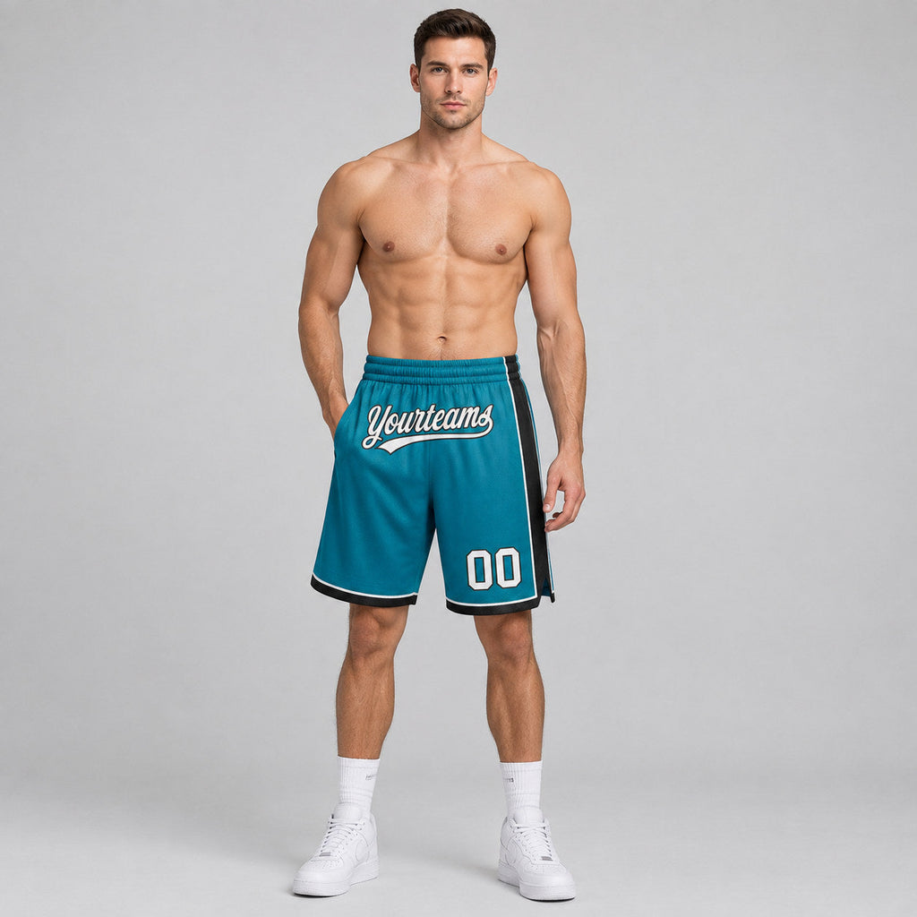 Custom Teal Authentic Basketball Shorts with White and Black Lettering worn by male model