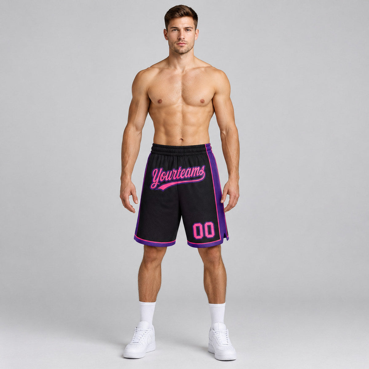 Custom Black Authentic Basketball Shorts with Pink and Purple Lettering worn by male model