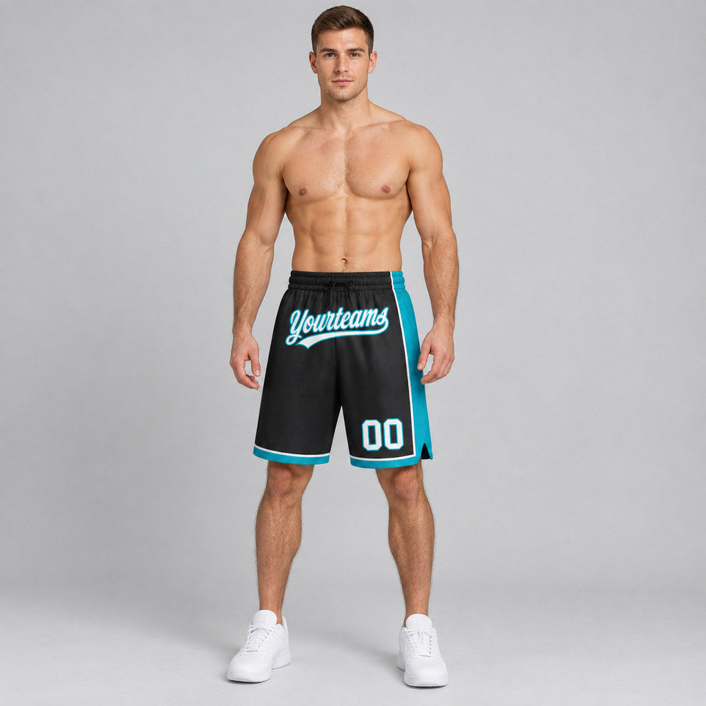 Custom Black Authentic Basketball Shorts with White and Teal Lettering worn by male model