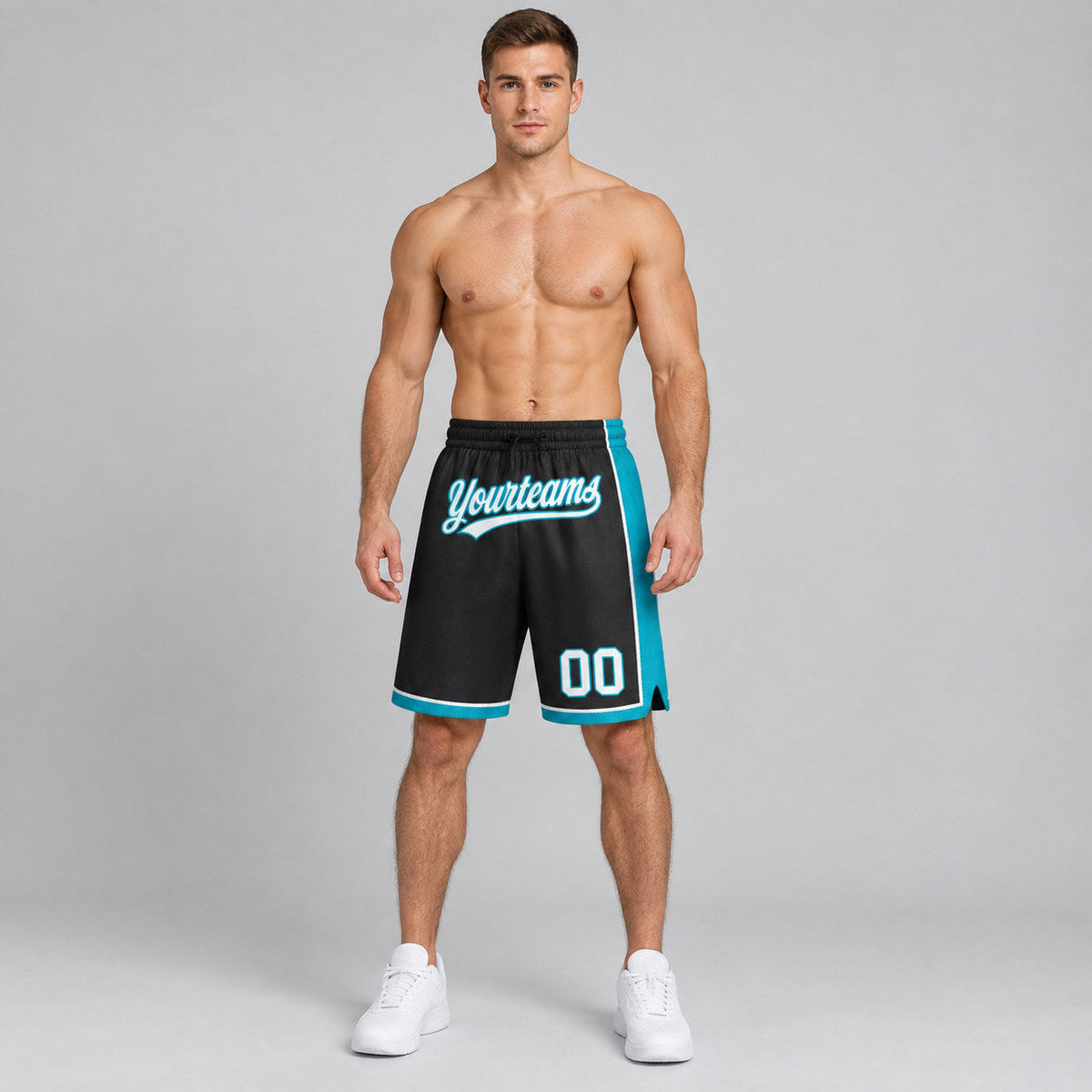 Custom Black Authentic Basketball Shorts with White and Teal Lettering worn by male model